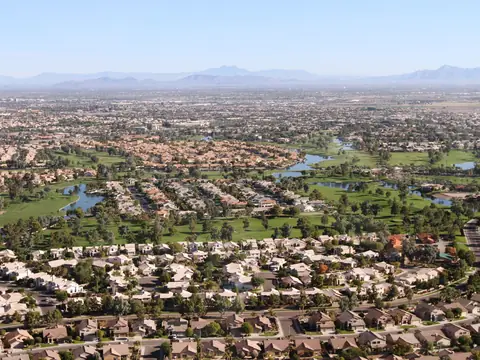 Chandler neighborhoods, golf greens and lakes seen from the air